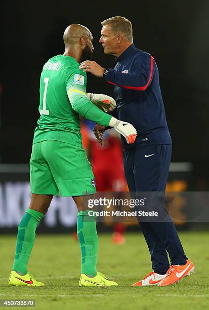 Tim Howard of the United States and goalkeeping coach Chris Woods celebrate victory after the 2014 FIFA World Cup Brazil Group G match between Ghana...