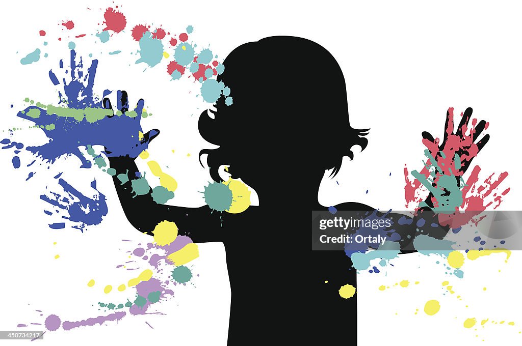 Outline of a child using different colors of finger paint 