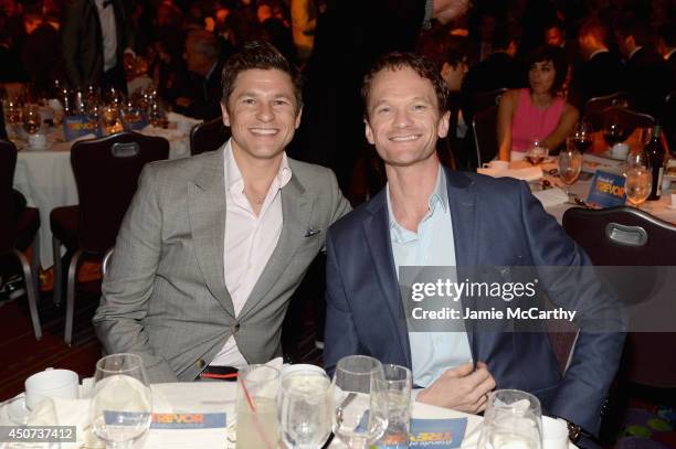 Actors David Burtka and Neil Patrick Harris attend the Trevor Project's 2014 "TrevorLIVE NY" Event at the Marriott Marquis Hotel on June 16, 2014 in...