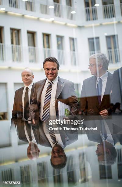 German Interior Minister Hans-Peter Friedrich arrives for a press conference at Bundespressekonferenz on November 20, 2013 in Berlin, Germany.