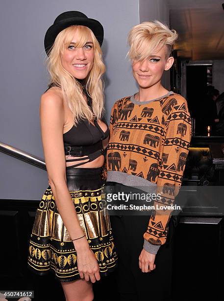 Olivia Nervo and Miriam Nervo of Nervo attend the Yves Saint Laurent Couture Palette & The Cinema Society premiere of The Weinstein Company's "Yves...