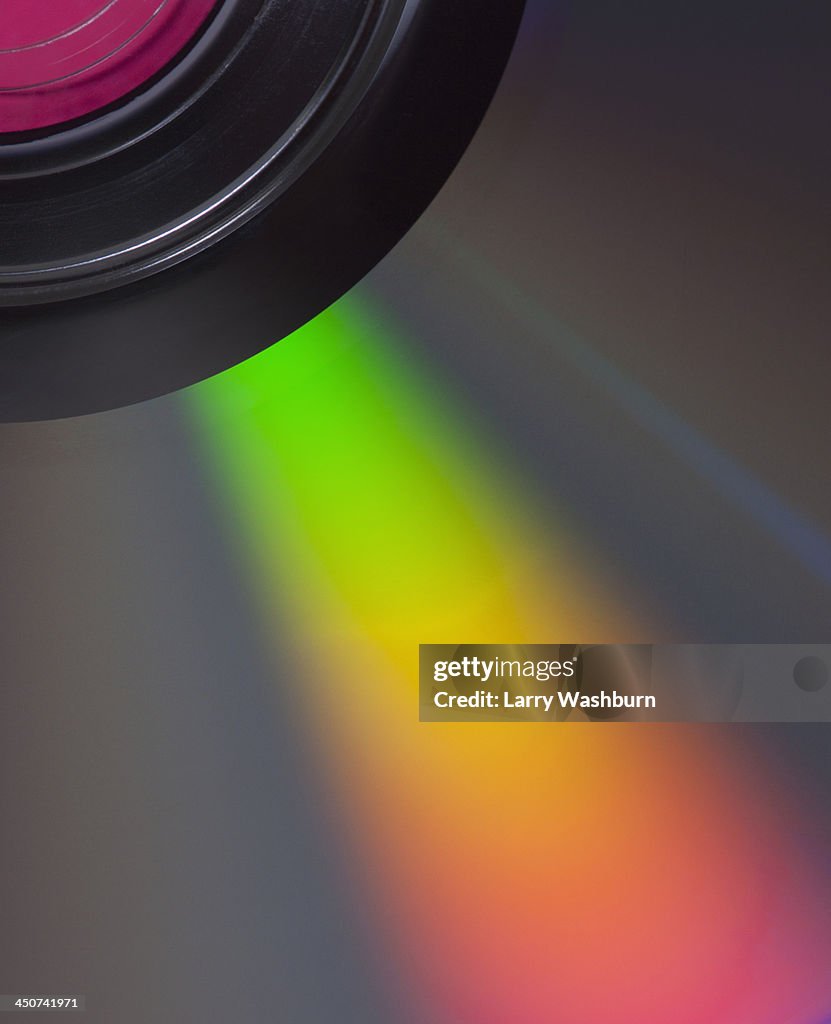 Detail of compact disc showing refracted spectral light