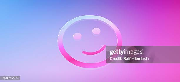 graphic of a smiley face against a blue and pink gradient background - smiley face emoticon stock illustrations