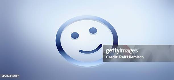 graphic of a smiley face against a blue gradient background - colourful background studio stock illustrations