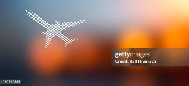 spot patterned airplane against soft defocused background - airplane rows stock illustrations