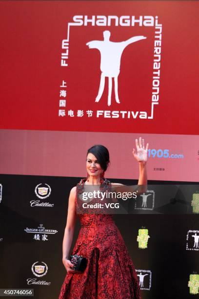 Italian actress Maria Grazia Cucinotta arrives for the red carpet of the 17th Shanghai International Film Festival at Shanghai Grand Theatre on June...