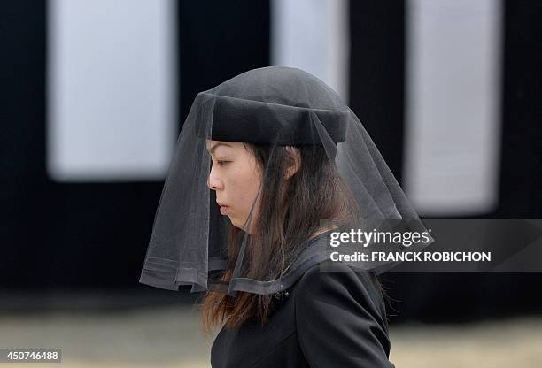 Japan's Princess Yoko attends the funeral service of the late Prince Katsura at Toshimagaoka cemetery in Tokyo on June 17, 2014. The Shinto-style...