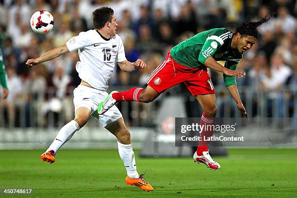 Carlos Peña of Mexico competes against Louis Fenton of New Zealand during leg 2 of the FIFA World Cup Qualifier match between the New Zealand All...