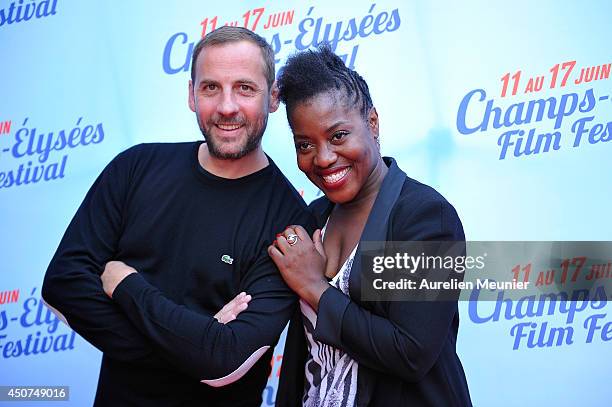 Fred Testot and Claudia Tagbo attend the Bon Retablissement! Paris Premiere during Day 6 of the Champs Elysees Film Festival on June 16, 2014 in...