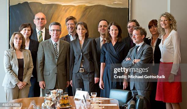 German Interior Minister Thomas de Maiziere meets with people of the generation of baby boomers born in the year 1964, on June 17, 2014 in Berlin,...