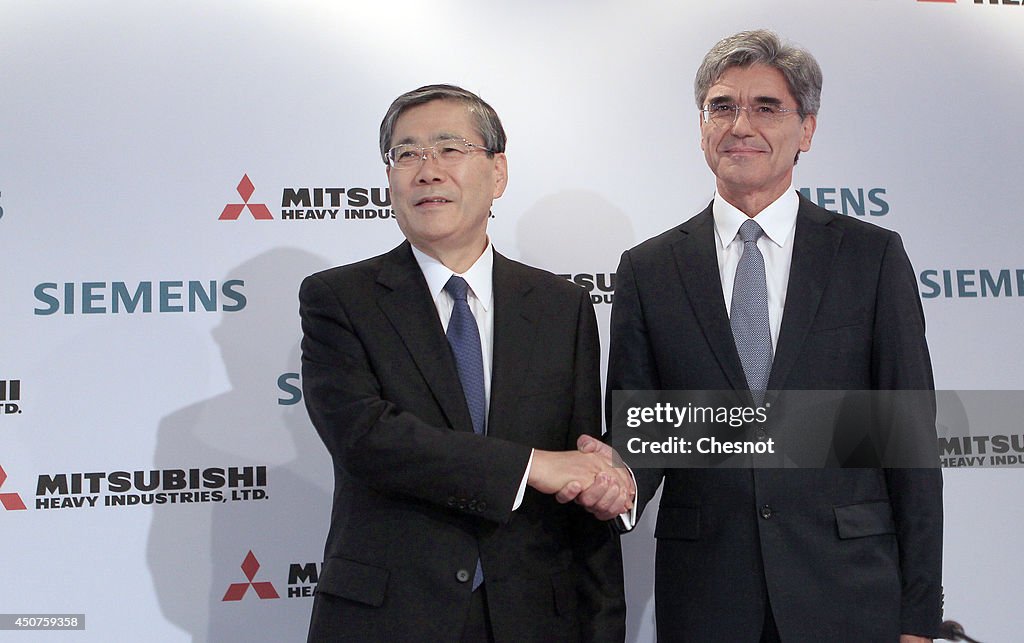 Joe KAISER, Siemens CEO And  Shunichi MIYANAGA,  Mitsubishi CEO Give Press Conference At Pavillon Gabriel