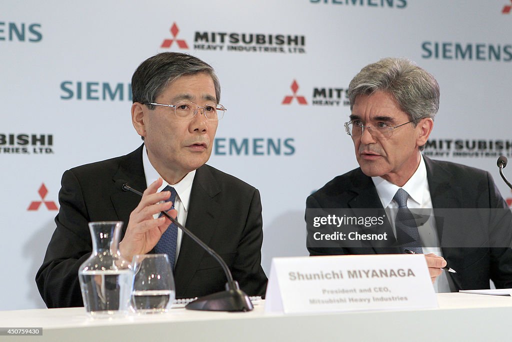 Joe KAISER, Siemens CEO And  Shunichi MIYANAGA,  Mitsubishi CEO Give Press Conference At Pavillon Gabriel