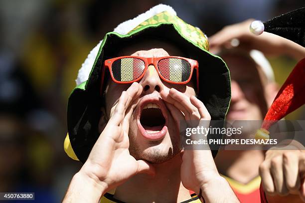 Belgium fans are pictured before the start of the Group H football match between Belgium and Algeria at the Mineirao Stadium in Belo Horizonte during...