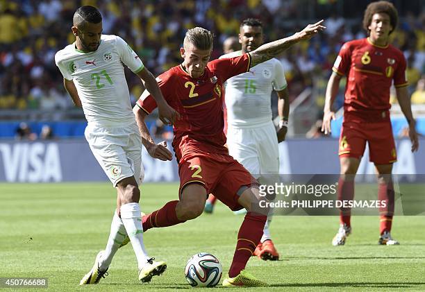 Algeria's forward Riyad Mahrez challenges Belgium's defender Toby Alderweireld during the Group H football match between Belgium and Algeria at the...