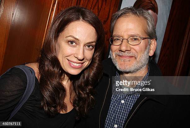 Kathleen McElfresh and husband Campbell Scott pose at the opening night party for "Taking Care of Baby" at Faces & Names Lounge on November 19, 2013...