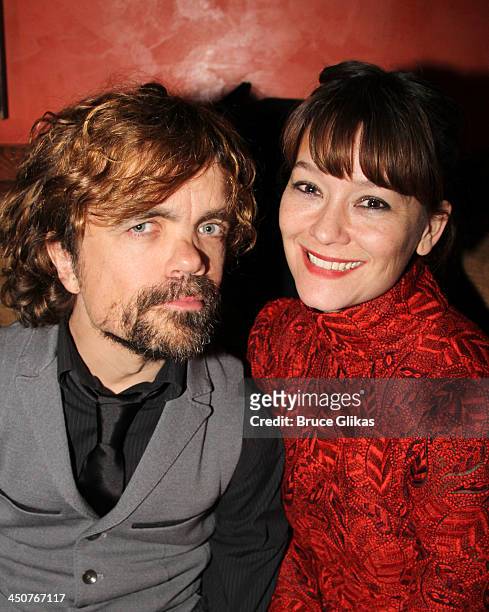 Peter Dinklage and wife director Erica Schmidt pose at the opening night party for "Taking Care of Baby" at Faces & Names Lounge on November 19, 2013...