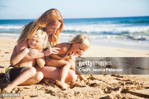 nudist   family daughter  and son Mother With Son On Beach High-Res Stock Photo - Getty Images