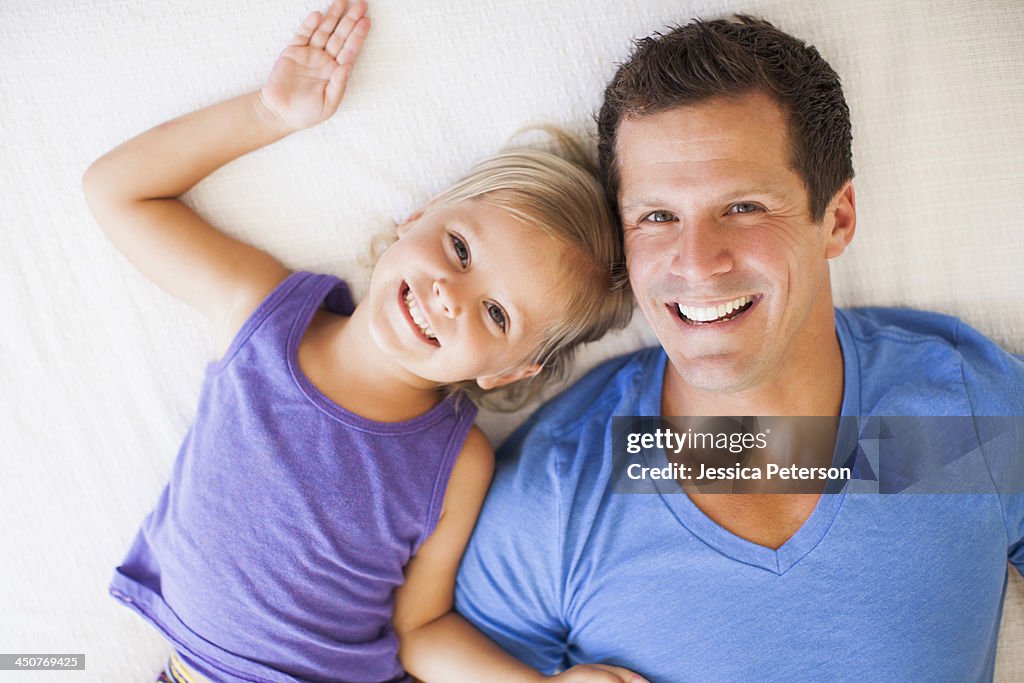 Father playing with daughter (2-3)