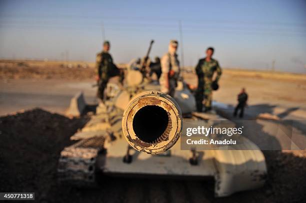 Kurdish Peshmerga forces stand guard in the oil-rich city of Kirkuk against Islamic State of Iraq and the Levant on June 17, 2014. Kurdish Peshmerga...