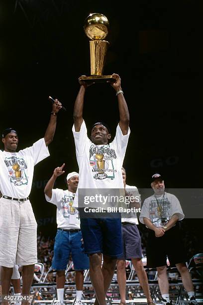 Avery Johnson of the San Antonio Spurs celebrates during the San Antonio Spurs Parade on the Riverwalk to celebrate the 1999 NBA Championship on June...