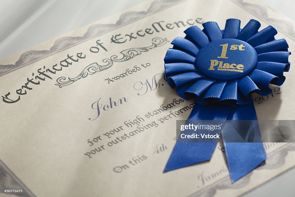Blue Ribbon Excellence Certificate Of Excellence And Blue Ribbon Photo - Getty Images