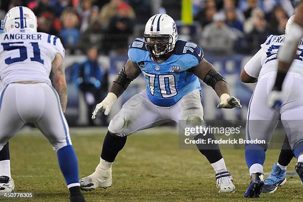 Rookie Chance Warmack of the Tennessee Titans blocks against the Indianapolis Colts at LP Field on November 14, 2013 in Nashville, Tennessee.