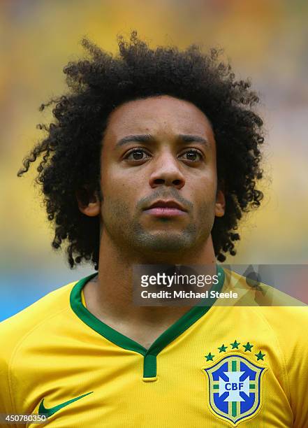 Marcelo of Brazil looks on before the 2014 FIFA World Cup Brazil Group A match between Brazil and Mexico at Castelao on June 17, 2014 in Fortaleza,...