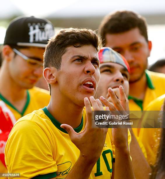 Brazilian fans attend the Group A Match between Brazil and Mexico at the FIFA Fan Fest at Taguatinga on June 17, 2014 in Brasilia, Brazil.