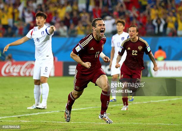 Aleksandr Kerzhakov of Russia celebrates scoring his team's first goal during the 2014 FIFA World Cup Brazil Group H match between Russia and South...