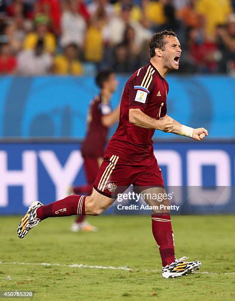 Aleksandr Kerzhakov of Russia celebrates scoring his team's first goal during the 2014 FIFA World Cup Brazil Group H match between Russia and South...