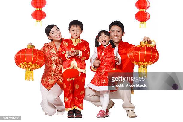 family on chinese new year - traditional clothing stock pictures, royalty-free photos & images