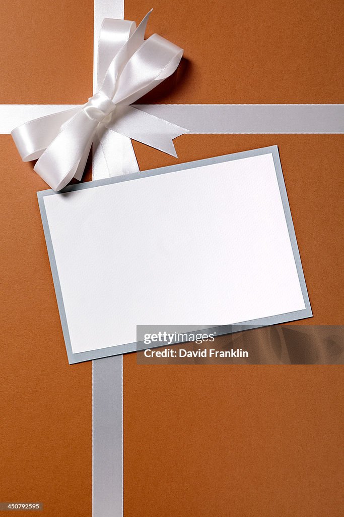 Paper Ribbon Package Brown Paper Package With White Ribbon And Label High-Res Stock Photo ...
