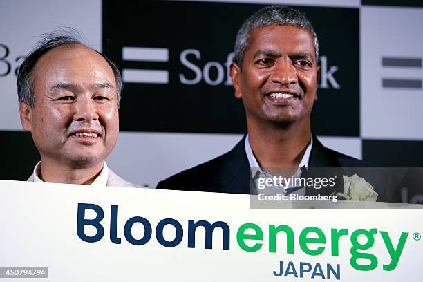 Billionaire Masayoshi Son, chairman and chief executive officer of SoftBank Corp., left, and K.R. Sridhar, co-founder and chief executive officer of...