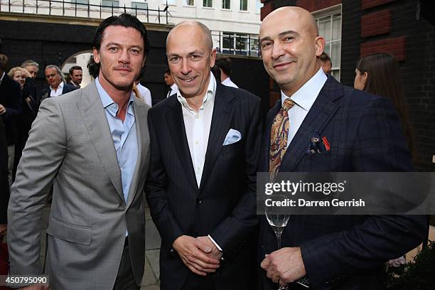 Luke Evans, Dylan Jones and Fabrizio Cardinali attends the GQ and Dunhill party during the London Collections: Men SS15 on June 17, 2014 in London,...