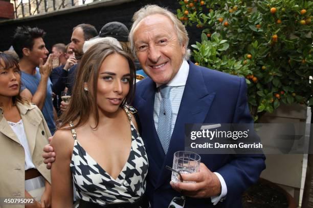 Chloe Green and Sir Harold Tillman attends the GQ and Dunhill party during the London Collections: Men SS15 on June 17, 2014 in London, England.