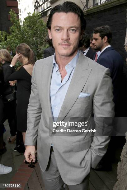 Luke Evans attends the GQ and Dunhill party during the London Collections: Men SS15 on June 17, 2014 in London, England.
