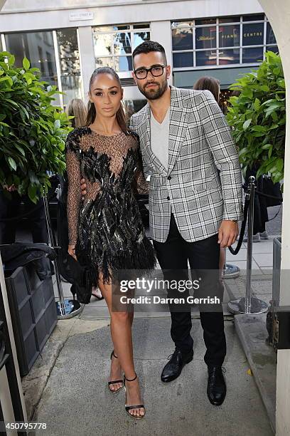 Cara Santana and Jessie Metcalfe attends the GQ and Dunhill party during the London Collections: Men SS15 on June 17, 2014 in London, England.