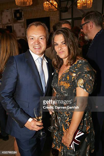 Graham Norton and Tracey Emin attends the GQ and LC:M Party during the London Collections: Men SS15 on June 17, 2014 in London, England.