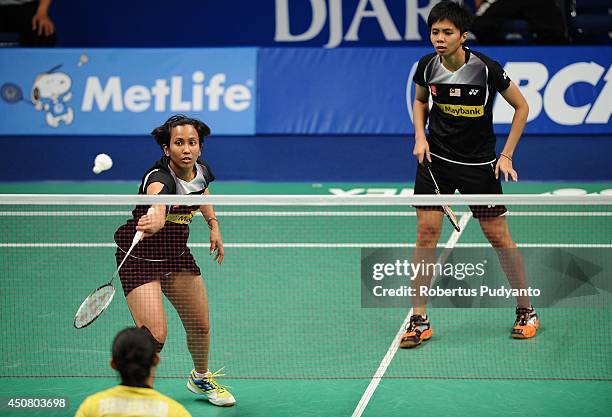 Jakarta indonesia amelia alicia anscelly and fie cho soong of malaysia return a shot against Jakarta indonesia amelia alicia anscelly and fie cho soong of malaysia return a shot against