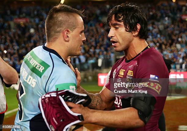 Johnathan Thurston of the Maroons speaks to Josh Reynolds of the Blues after game two of the State of Origin series between the New South Wales Blues...
