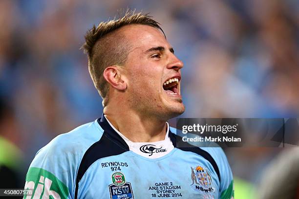Josh Reynolds of the Blues celebrates winning the series after winning game two of the State of Origin series between the New South Wales Blues and...