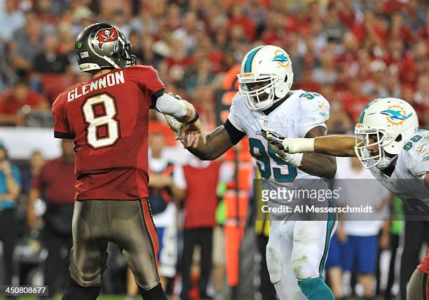 Defensive end Dion Jordan of the Miami Dolphins rushes quarterback Mike Glennon of the Tampa Bay Buccaneers November 11, 2013 at Raymond James...