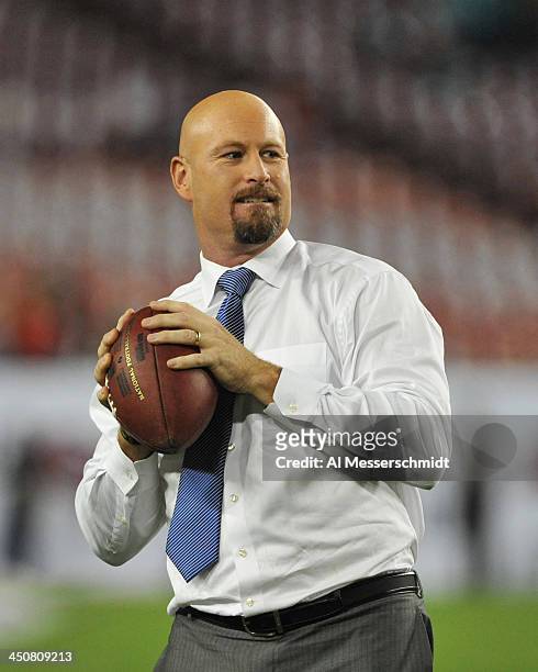 Monday Night Football commentator Trent Dilfer sets to pass on the field before the Miami Dolphins play against the Tampa Bay Buccaneers November 11,...