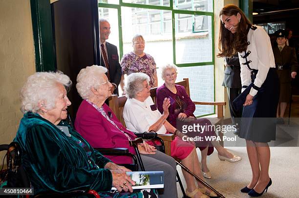 Catherine, Duchess Of Cambridge meets veterans Peggy Huntington, Joan Joslin Iris King and Alma Wightman as she tours the of the restored WWII...