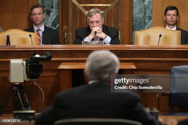 Senate Appropriations Committee Defense Subcommittee Chairman Richard Durbin listens to testimony from Defense Secretary Chuck Hagel during a hearing...