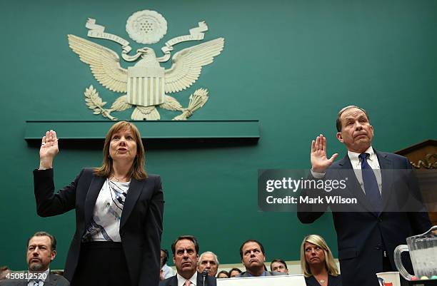 General Motors CEO Mary Barra , and Anton Valukas, head of GM's internal recall investigations are sworn in before testifying during a House Energy...