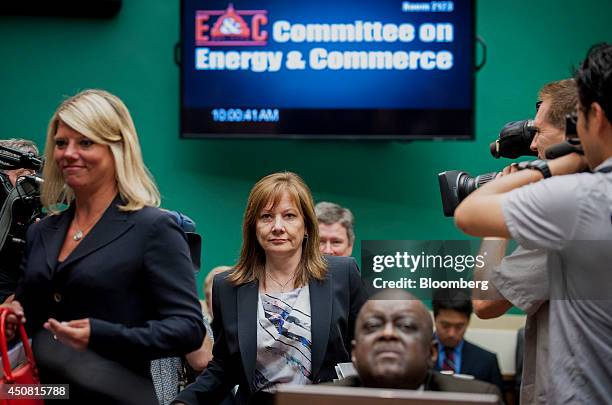 Mary Barra, chief executive officer of General Motors Co., center, arrives to testify at a U.S. House Subcommittee on Oversight and Investigations...