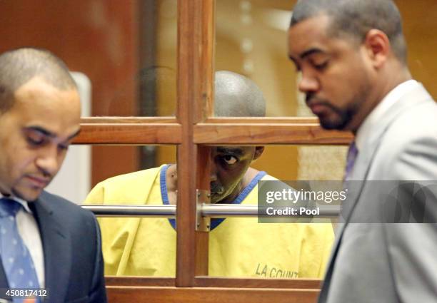 Actor Michael Jace appears in court for his arraignment on murder charges June 18, 2014 in Los Angeles, California. Jace is charged with the May 19...