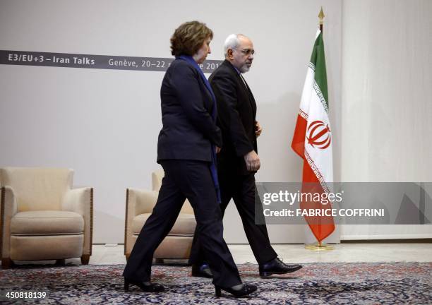 Iranian Foreign Minister Mohammad Javad Zarif and EU foreign policy chief Catherine Ashton arrive for closed-door nuclear talks in Geneva on November...