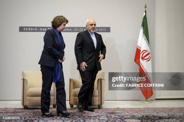 Iranian Foreign Minister Mohammad Javad Zarif and EU foreign policy chief Catherine Ashton arrive for closed-door nuclear talks in Geneva on November...